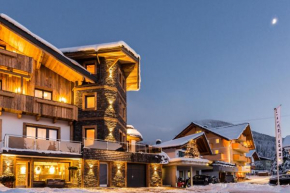 Отель Knappensteig Appartements, Ваграйн